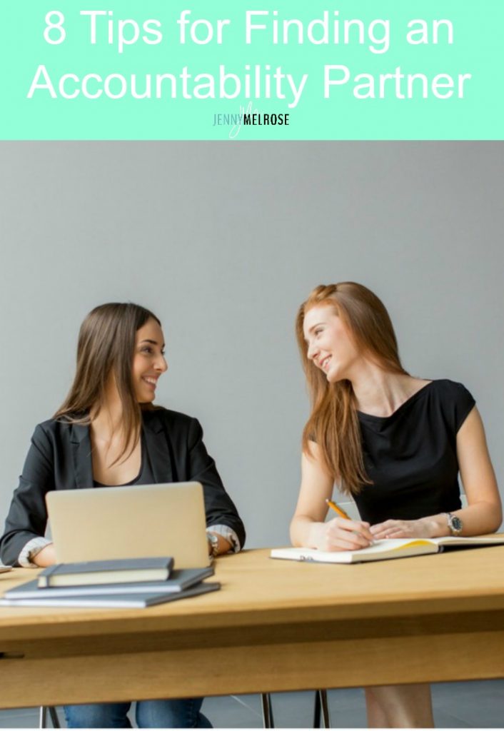 Accountability partners sitting at a desk going over their gols